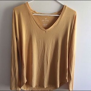 Yellow long sleeved top